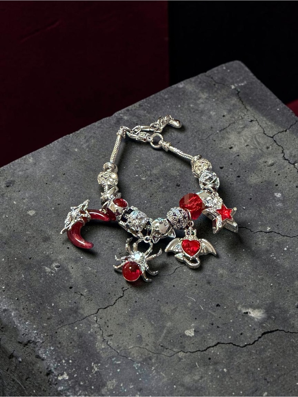 Silver Charm Bracelet with Red Crystal Accents